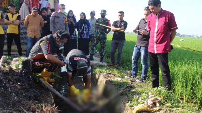 Suasana penemuan mayat terapung di irigasi sawah Lingkungan Ujung Bulo, Kelurahan Lembang Parang, Kecamatan Barombong, Kabupaten Gowa, Sulsel, Jumat (7/6/2024)