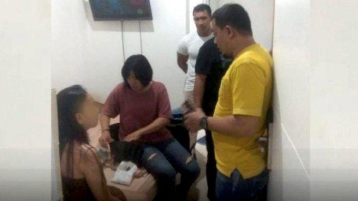 Anggota Polsek Mapanget Manado menggerebek salah satu penginapan di Kelurahan Buha tempat terjadi TPPO.