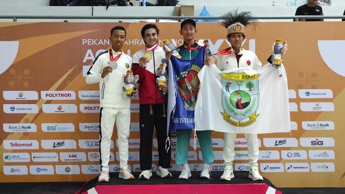 Atlet hapkido Sulut, Andreas Waturandang (kedua dari kiri) meraih emas ketiga bagi Sulawesi Utara di PON XXI/2024, Rabu (11/9/2024).