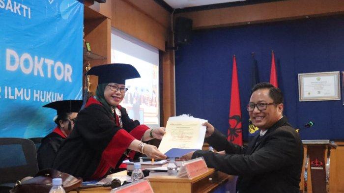 Ujian promosi Doktor Ilmu Hukum Fakultas Hukum Univertias Trisakti, Michael Jacobus, di Auditorium E. Suherman gedung H lantai 2, Jumat (20/12/2024).