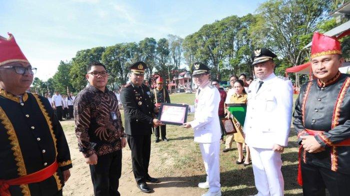 Pemerintah Kota Manado melaksanakan upacara dalam rangka HUT ke-400, di Lapangan Sparta Tikala Manado