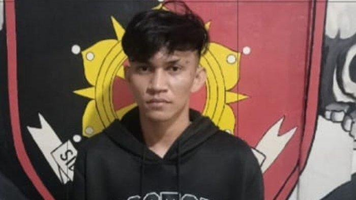 KASUS PEMBUNUHAN - Pelaku saat diamankan polisi, Kamis 6 Maret 2025. Terkait kasus pembunuhan di Girian Atas Bitung.