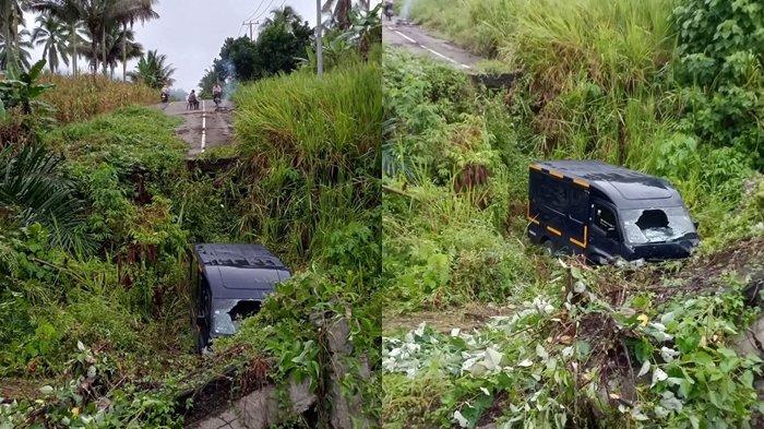 Kecelakaan sebuah mobil pengangkut uang ATM di Kabupaten Bolaang Mongondow, Sulawesi Utara, Rabu (08/01/2025). 