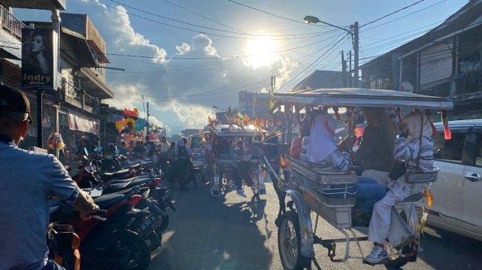 Pasiar Nae Bendi tradisi Natal khas Langowan, Minahasa, Sulawesi Utara.