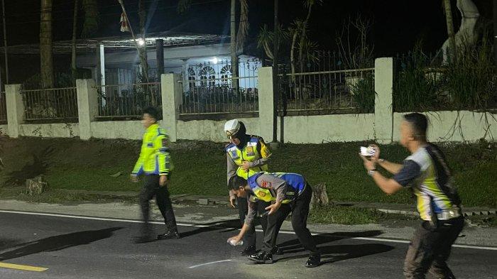 Personil Satlantas Polres Bitung lakukan Olah TKP lagi di malam hari.