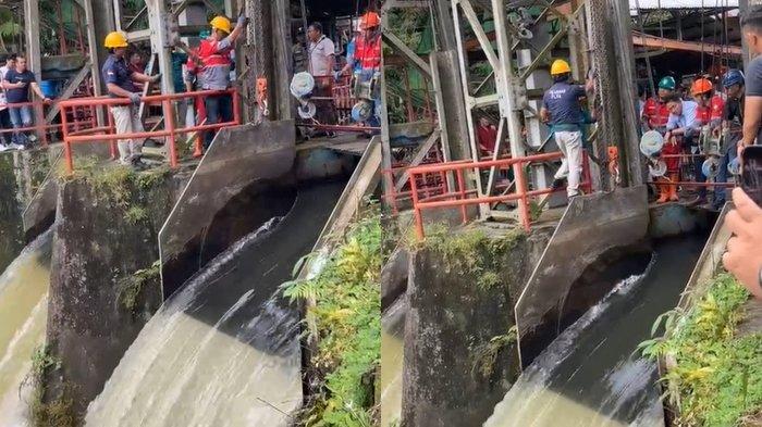 PINTU AIR - Suasana di tempat Pintu Air Tonsea Lama (DAS Tondano) yang dibuka penuh hari ini, Rabu 28 Mei 2025. Pembukaan penuh pintu air ini jadi langkah tanggap darurat Pemkab Minahasa.