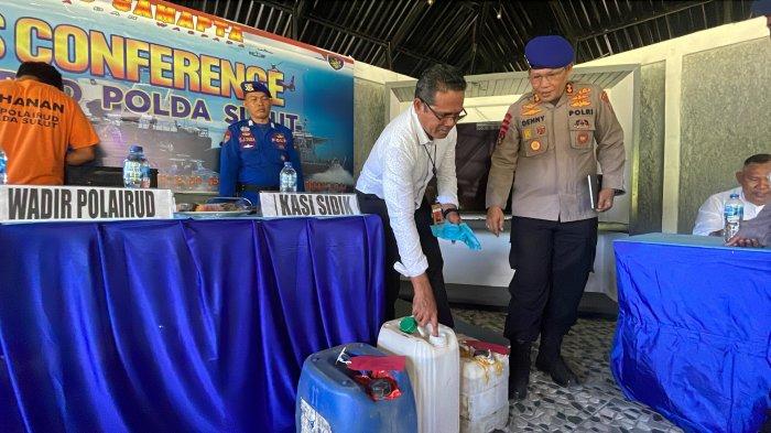 Polisi Ditpolairud Polda Sulut melakukan pemeriksaan terhadap barang bukti ratusan gelon isi BBM bersubsidi jenis minyak tanah dalam perkara tindak pidana Migas.