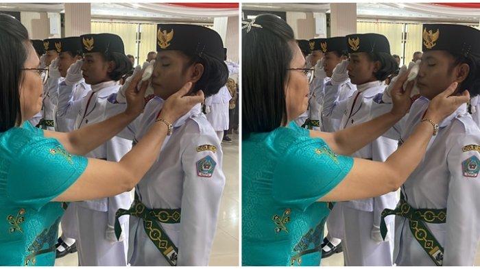 Paskibraka Kota Bitung menitikkan air mata ketika proses pengukuhan di SH Sarundajang Hall Kantor Wali Kota Bitung, Sulawesi Utara, Selasa (15/8/2023).