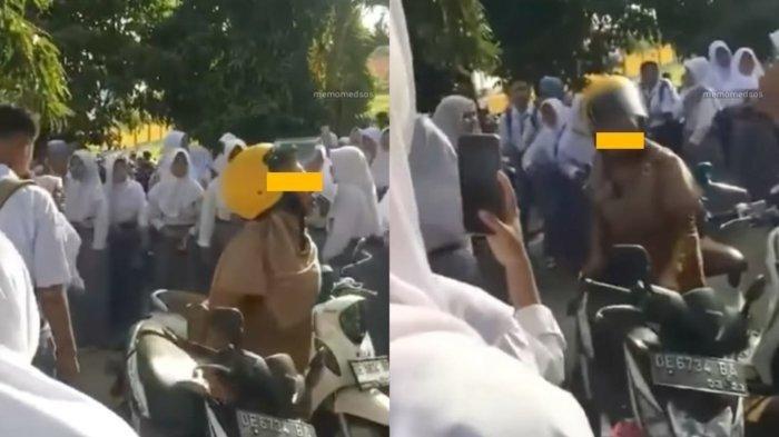 Sebuah video memperlihatkan seorang guru di-bully siswanya sendiri saat akan pulang sekolah viral di media sosial.