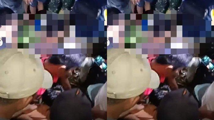 Warga evakuasi mayat korban pembunuhan bocah bernama Tilfa Azahra Mokoagow, di Tutuyan, Boltim.