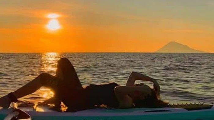 Paddle Board Manado - Rekomendasi tempat menikmati sunset di Kota Manado, Sulawesi Utara
