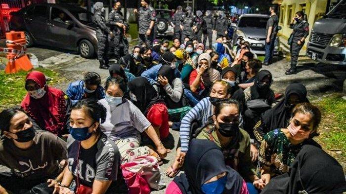 ORANG ASING - Ilustrasi imigran Indonesia yang diamankan petugas Imigrasi di Kuala Lumpur.