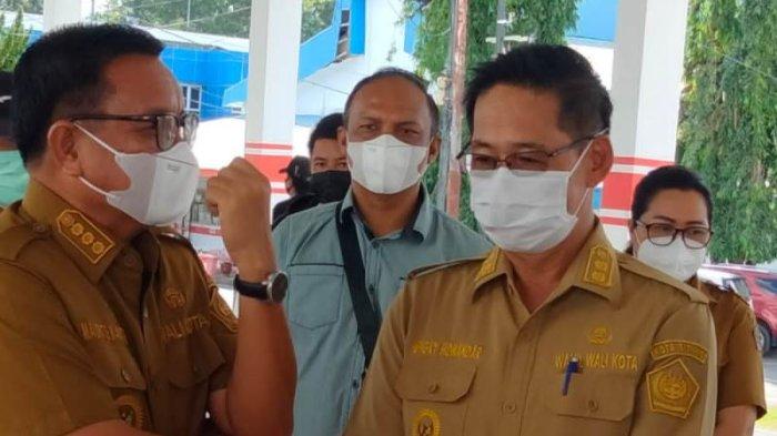 Maurits Mantiri dan Hengky Honandar Wali kota dan Wakil Wali Kota Bitung.