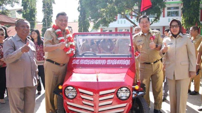 Wali Kota Kotamobagu Tatong Bara saat bersama Gubernur Sulawesi Utara Olly Dondokambey dan Wagub Steven Kandouw.