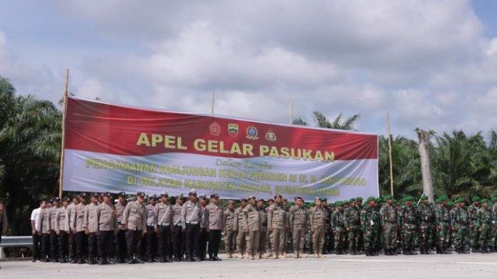 Apel gelar pasukan persiapan kedatangan Presiden Republik Indonesia, Joko Widodo ke Kisaran, Kabupaten Asahan dalam peresmian gerbang tol seksi 5, Kisaran, Rabu (16/10/2024). 1.400 personel TNI - Polri disiagakan.