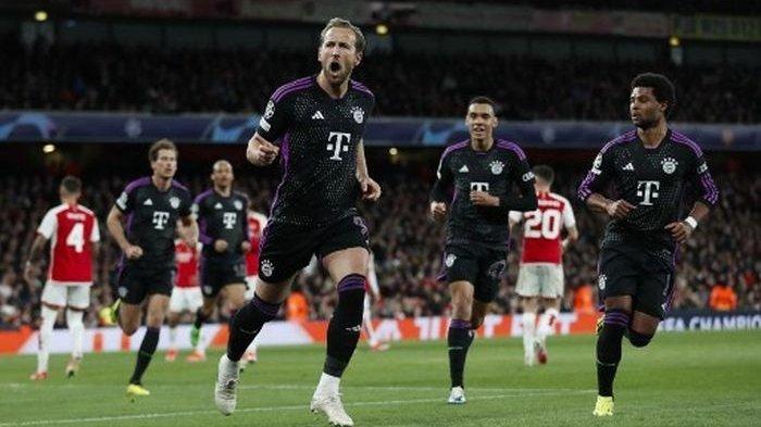 Striker Bayern Muenchen, Harry Kane, merayakan gol yang dicetaknya ke gawang Arsenal dalam laga leg pertama babak perempat final Liga Champions, Selasa (9/4/2024) di Stadion Emirates.