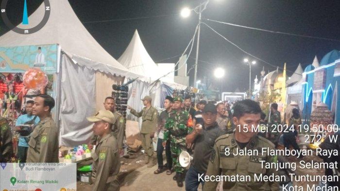 Diduga pedagang diusir dan dagangannya di buang pada kegiatan MTQ ke-57 Medan, Kamis (16/5/2024). Camat Medan Tuntungan Berani mengatakan, pedagang itu diusir karena tidak mendaftar secara resmi dan bantah petugas gabungan yang membuang dagangan para pedagang tersebut.