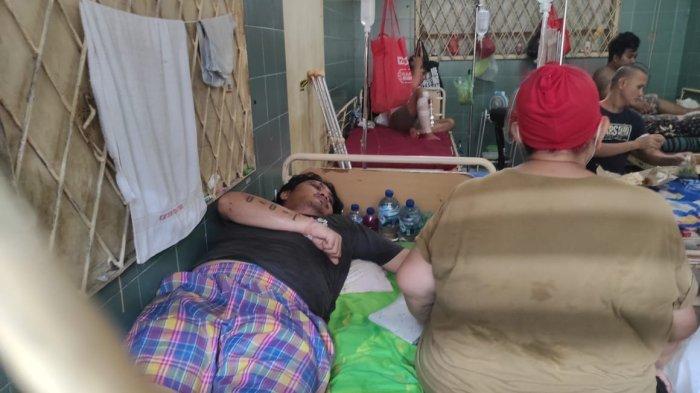 Doli Manurung, 34 tahun, tersangka dugaan penganiayaan personel TNI dari Batalyon Infanteri 100/Raider saat berada di RS Bhayangkara TK II Medan. Doli ngaku tak terlibat pengeroyokan Prada Defliadi.