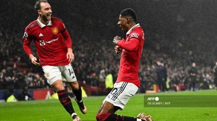 Striker Inggris Manchester United Marcus Rashford merayakan setelah mencetak gol pertama melecehkan selama pertandingan sepak bola Liga Premier Inggris antara Manchester United dan Nottingham Forest di Old Trafford di Manchester, barat laut Inggris, pada 27 Desember 2022. Oli SCARFF / AFP