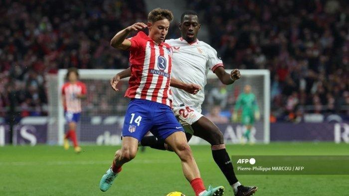 Gelandang Spanyol Atletico Madrid #14 Marcos Llorente 