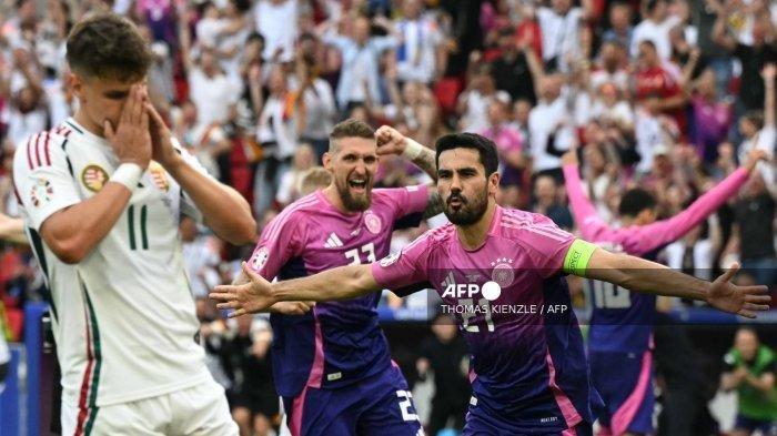 Hasil Euro 2024 Tadi Malam: Jerman Pesta ke 16 Besar, Skotlandia & Swiss Berbagi Poin - Ilkay Gundogan merayakan gol pada pertandingan Euro 2024 antara Jerman dan Hongaria pada 19 Juni 2024. (Foto oleh THOMAS KIENZLE / AFP)