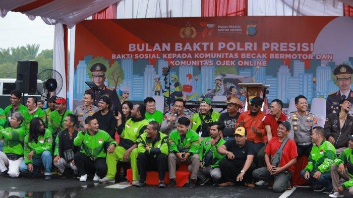 Kapolda Sumut Irjen Pol Panca Putra Simanjuntak dengar Curhatan Pengendara Ojol dan Parbetor, di Lapangan Merdeka Medan, Jumat (23/6/2023)