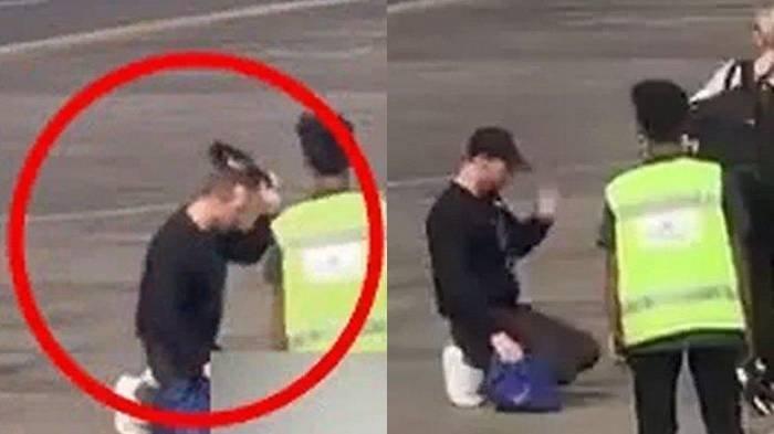 Momen Chris Martin bersujud dan mencium landasan pacu bandara. Sebelumnya, ia juga sempat berpantun pinjam dulu seratus.