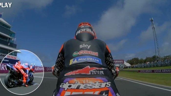 Cuplikan tayangan ulang saat Marc Marquez (dilingkari) berusaha mengambil lagi plastik pelindung kaca helmnya jelang start MotoGP Australia di Sirkuit Phillip Island, Australia, 20 Oktober 2024