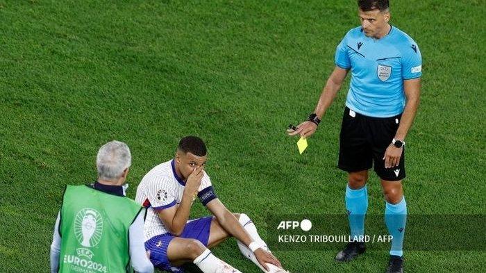 Kylian Mbappe mendapatkan kartu kuning dan hidungnya mengalami cedera dalam laga Prancis vs Austria di Grup D EURO 2024, Senin (17/6/2024) di Duesseldorf.