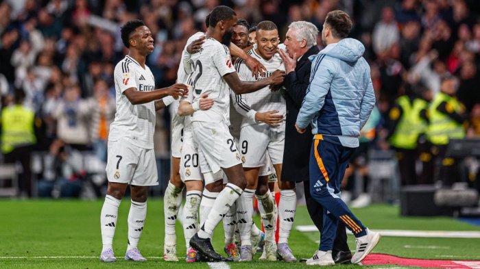 SELEBRASI - Pemain Real Madrid selebrasi usai cetak gol ke gawang Leganes. Real Madrid meraih kemenangan 3-2 atas Leganes pada laga pekan ke-29 Liga Spanyol di Stadion Santiago Bernabeu, Sabtu (29/3/2025).