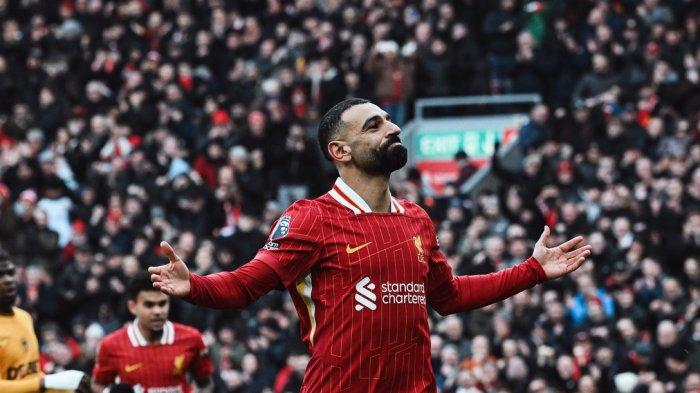 SELEBRASI - Penyerang Liverpool, Mohamed Salah selebrasi usai cetak gol ke gawang Wolves. Dalam laga ini Liverpool menang 2-1 atas Wolves pada pekan ke-25 Liga Inggris 2024-2025, Minggu (16/2/2025)