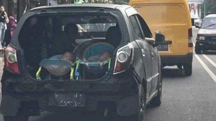 Viral pengendara mobil letak dua bayi di bagasi saat tengah berkendara di kawasan Pasar Gede, Surakarta, Senin (13/11/2023) sekitar pukul 14:53 wib.