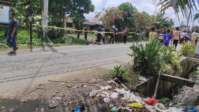 Personel Polisi Militer (PM) melakukan olah tempat kejadian perkara (TKP) di lokasi penyerangan puluhan pria berambut cepak berbadan tegap yang terjadi di Desa Selamat, Kecamatan Sibiru-biru, Kabupaten Deliserdang, Sumatera Utara, Sabtu (9/11/2024) siang. Satu orang warga berinisial RB meninggal dunia dan lainnya luka-luka.