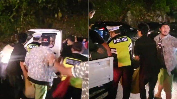 Personel Polres Tanah Karo beserta warga membantu proses evakuasi jenazah wanita asal Kota Binjai yang terjatuh ke jurang di kawasan Penatapan, Berastagi, Jumat (12/4/2024) malam.