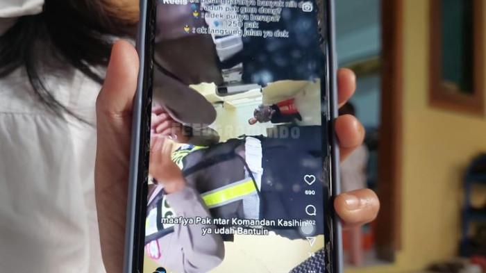 Beredar sebuah video yang memperlihatkan oknum anggota polisi menerima uang suap dari pengemudi yang ditilang di persimpangan Cimareme, Kabupaten Bandung Barat (KBB), Jawa Barat, Jumat (18/7/2025).(KOMPAS.com/BAGUS PUJI PANUNTUN)