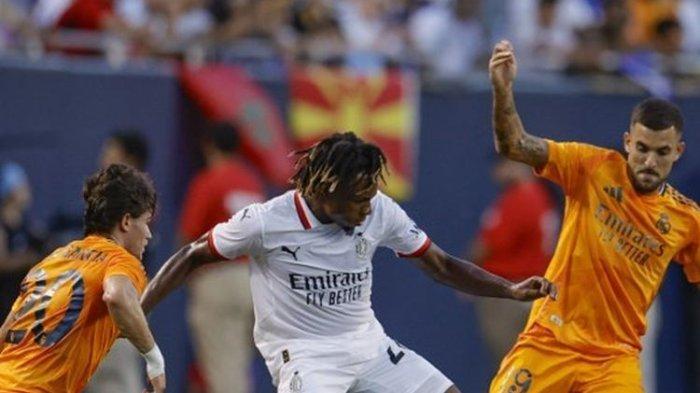 Pertandingan Real Madrid vs AC Milan dalam laga persahabatan di Soldier Field, Chicago, Amerika Serikat, Kamis (1/8/2024) pagi WIB. (Photo by KAMIL KRZACZYNSKI / AFP)(AFP/KAMIL KRZACZYNSKI)