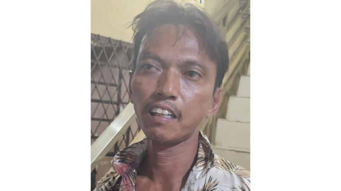 Tampang Riswandi alias Oam, pelaku penikaman terhadap pekerja warung di Jalan Puri, Kecamatan Medan Area. Kini pelaku sudah dijebloskan ke dalam penjara.
