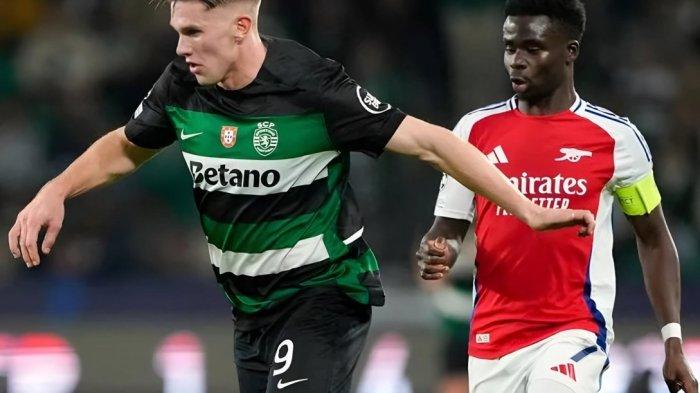 VICTOR GYOKERS: Penyerang Sporting CP, Victor Gyokeres (kiri) saat berhadapan dengan penyerang Arsenal Bukayo Saka pada duel di Liga Champions 2024-2025.