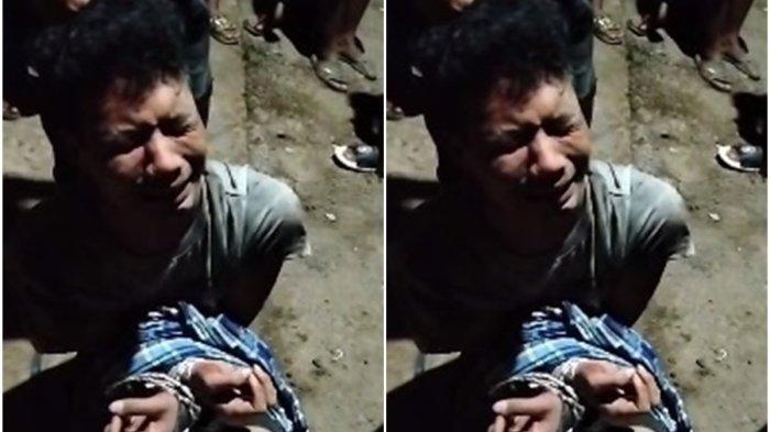 Andri (26) pelaku pembacokan terhadap kedua mertunya di Banyuasin tampak menangis saat diamankan warga sesaat setelah dia melukai kedua korban, Jumat (17/5/2024) sekitar pukul 21.15 malam.