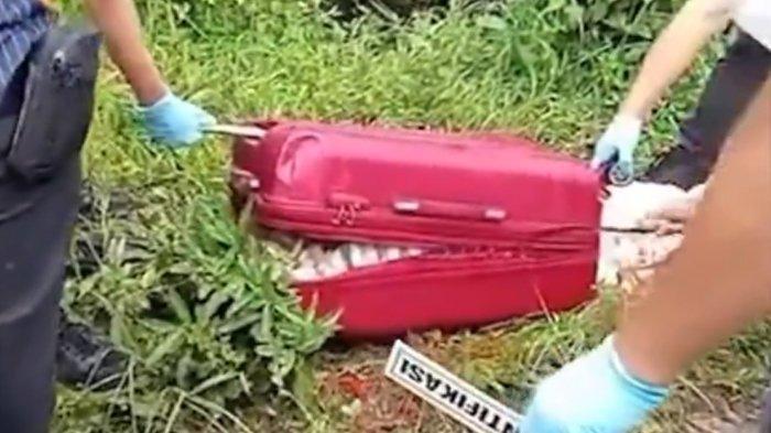 Tangkap layar detik-detik polisi membongkar koper berisi mayat wanita tanpa kepala dan kaki, yang diduga korban mutilasi, di Desa Dadapan, Kecamatan Kendal, Kabupaten Ngawi, Jawa Timur, Kamis (23/1/2025).