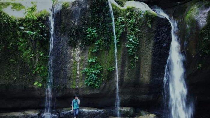 Salah satu pengunjung menikmati suasana yang ada di air terjun pelangi di kawasan Kecamatan STM Hulu Kabupaten Deliserdang beberapa waktu lalu.