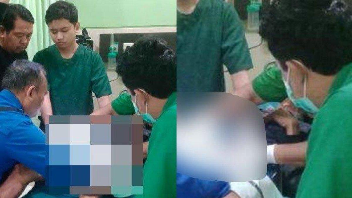 DRAMA PENYELAMATAN ALAT VITAL - Petugas Damkar dan Tim Medis RSUD Widodo Ngawi, mencoba melepas pipa paralon yang terpasang di bagian kemaluan seorang kakek, Selasa (13/5/2025). Terungkap alasan si kakek pasang paralon di kemaluannya.