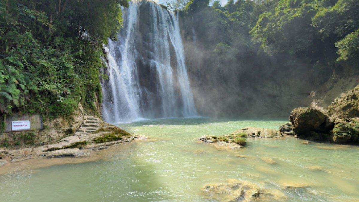 WISATA AIR - Potret Air Terjun Nglirip diambil dari Google Street View pada Jumat (28/3/2025). Air Terjun Nglirip berada di Tuban, Jawa Timur.