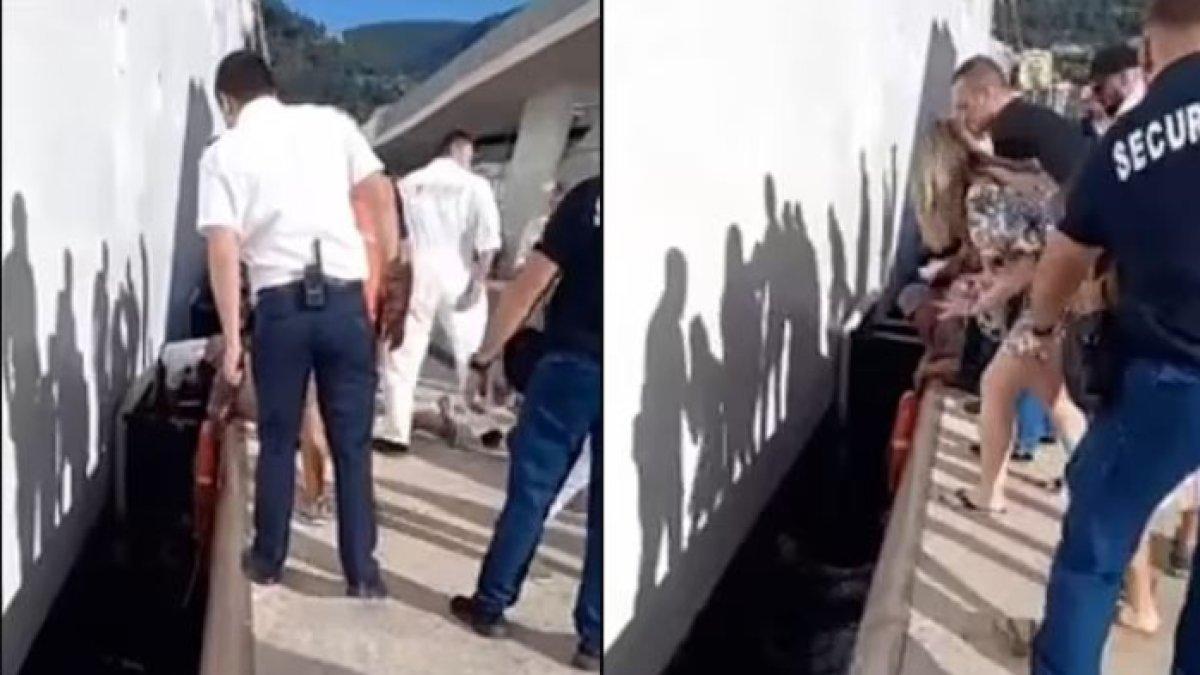 Seorang wanita bergegas mondar-mandir di dermaga, sepertinya mencari anak laki-laki itu. Dia kemudian terlihat bergegas dan merawatnya setelah dia mencapai tempat aman