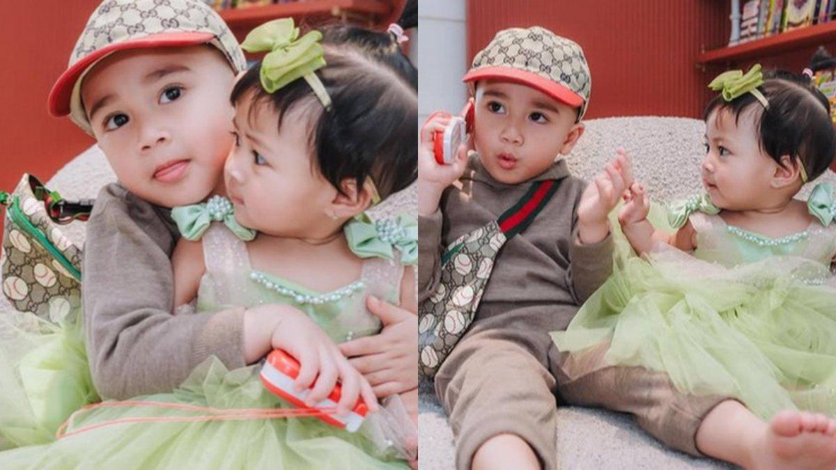 Baby Lily tampak menggemaskan saat mengenakan dress hijau.