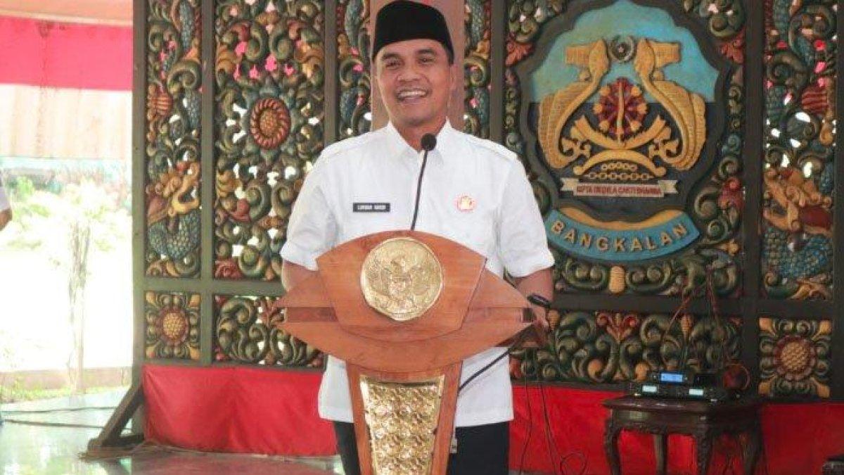 PROGRAM BUPATI BANGKALAN - Bupati Bangkalan, Lukman Hakim, Senin (23/6/2025). Dalam agenda Pembinaan Peningkatan Kapasitas Aparatur Pemerintah Desa Tahun 2025, Pemerintah Kabupaten Bangkalan, Madura, meresmikan kerja sama strategis dengan Fastpay.