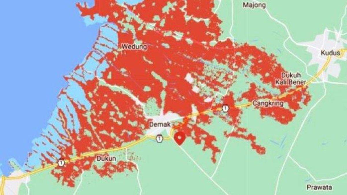 DEMAK TERANCAM TENGGELAM - Tangkapan layar peta interaktif di situs coastal.climatecentral.org. Warna merah terang menandai kawasan yang akan hilang terendam laut, termasuk jalan nasional Pantura dan permukiman padat penduduk di Kecamatan Sayung hingga Karanganyar, Kabupaten Demak pada 2030 atau lima tahun ke depan.