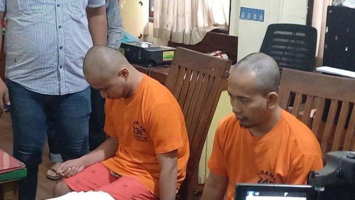 Dua pelaku penyiraman air leras saat diamankan Polresta Yogyakarta, Kamis (26/12/2024)