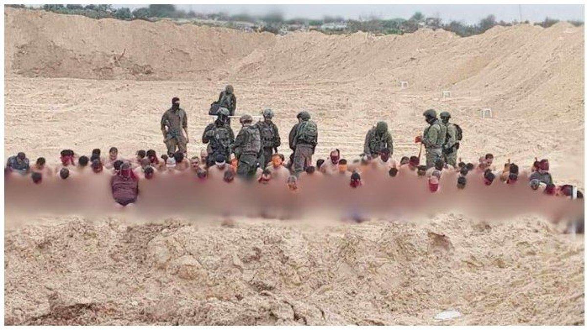 Gambar yang diposting online menunjukkan pria Palestina ditahan oleh tentara IDF (Sensor)