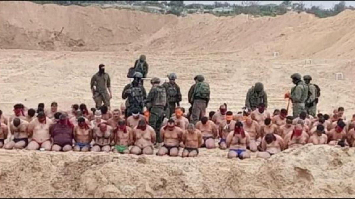 Gambar yang diposting online menunjukkan pria Palestina ditahan oleh tentara IDF